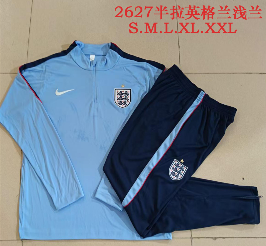 26/27 Adults Half Pull England Light Blue Tracksuit - Image 1